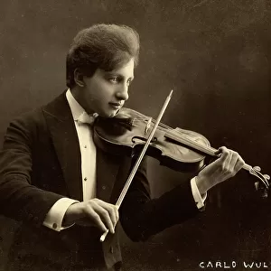 The violinist Cesare Barison, playing his instrument