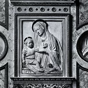 Virgin with Child: high-relief, long attributed to Mino da Fiesole in the sacristy of the church of St. Maria Maggiore, Rome