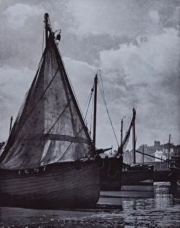all the fishing fleet of slender spars Range at their moorings, veer with tide about, V Sackville-West (b/w photo) all the fishing fleet of slender spars Range at their moorings, veer with tide about, V Sackville-West (b/w photo)