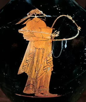 Ancient Greece: Comaste holding a skyphos and playing Barbiton (Comaste