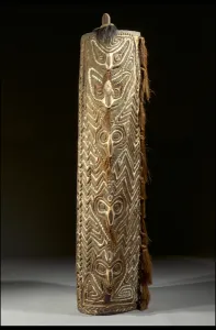 Curved rectangular Sepik shield, the front with central band of five masks