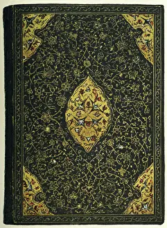 An example of Persian bookbinding from 1417, leather covered boards decorated with coloured enamels