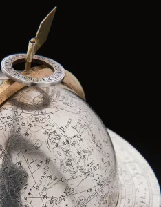 Supporting Prints: Two exceptional terrestrial and celestial globes, supported by Hercules and Atlas