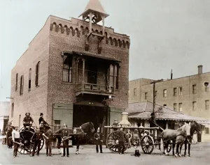 Fire brigade posing outside the barracks, Los Angeles. California, USA. 1887. Photography