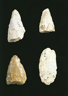 Hand Tool Prints: Flint tools on black background