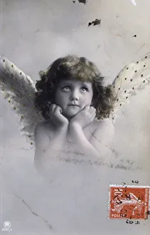 Mid Length Hair Prints: French postcard dated circa, 1900, showing a young angel with wings