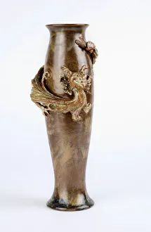 Green and Brown glazed vase with a moulded dragon relief, Doulton & Co., Lambeth, c Green and Brown glazed vase with a moulded dragon relief, Doulton & Co., Lambeth, c