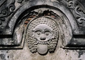 Indonesia, Java, Mask showing head of Kala, near entrance of Taman Sari complex near Yogyakarta, 17th century