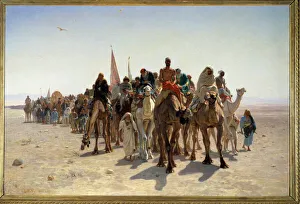Pelerins going to Mecca Carvane from travelers on camels in the desert Pelerins going to Mecca Carvane from travelers on camels in the desert