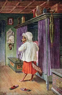 Postcard depicting the wolf disguised as Little Red Riding Hood's grandmother (colour litho) Postcard depicting the wolf disguised as Little Red Riding Hood's grandmother (colour litho)