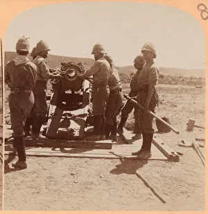 Putting a Shell into a Siege Train at the Modder, South Africa. 1899 (b / w photo)