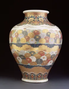 A Satsuma vase painted with chrysanthemums, late 19th century (earthenware with enamel) A Satsuma vase painted with chrysanthemums, late 19th century (earthenware with enamel)