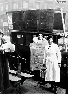 Womens Rights Prints: Suffragettes preparing to paste their posters, circa 1920