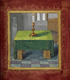 Images Dated 25th February 2025: A table with a burning candle