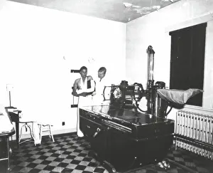 Patient Prints: A technician preparing an x-ray