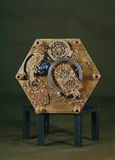 Pierced Prints: Underneath of a hexagonal table clock movement by Nicolas Lemaindre, 1619 (gilt-metal)