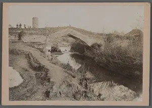 Bank Prints: View of a River with Bridge-Tower of Patterned Brickwork